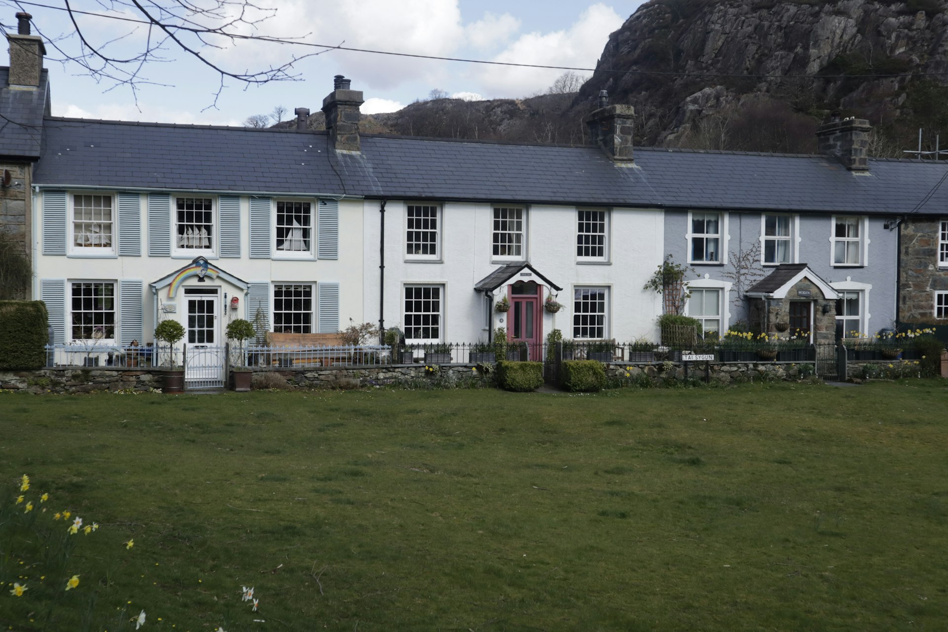 a large house with a lawn in front of it
